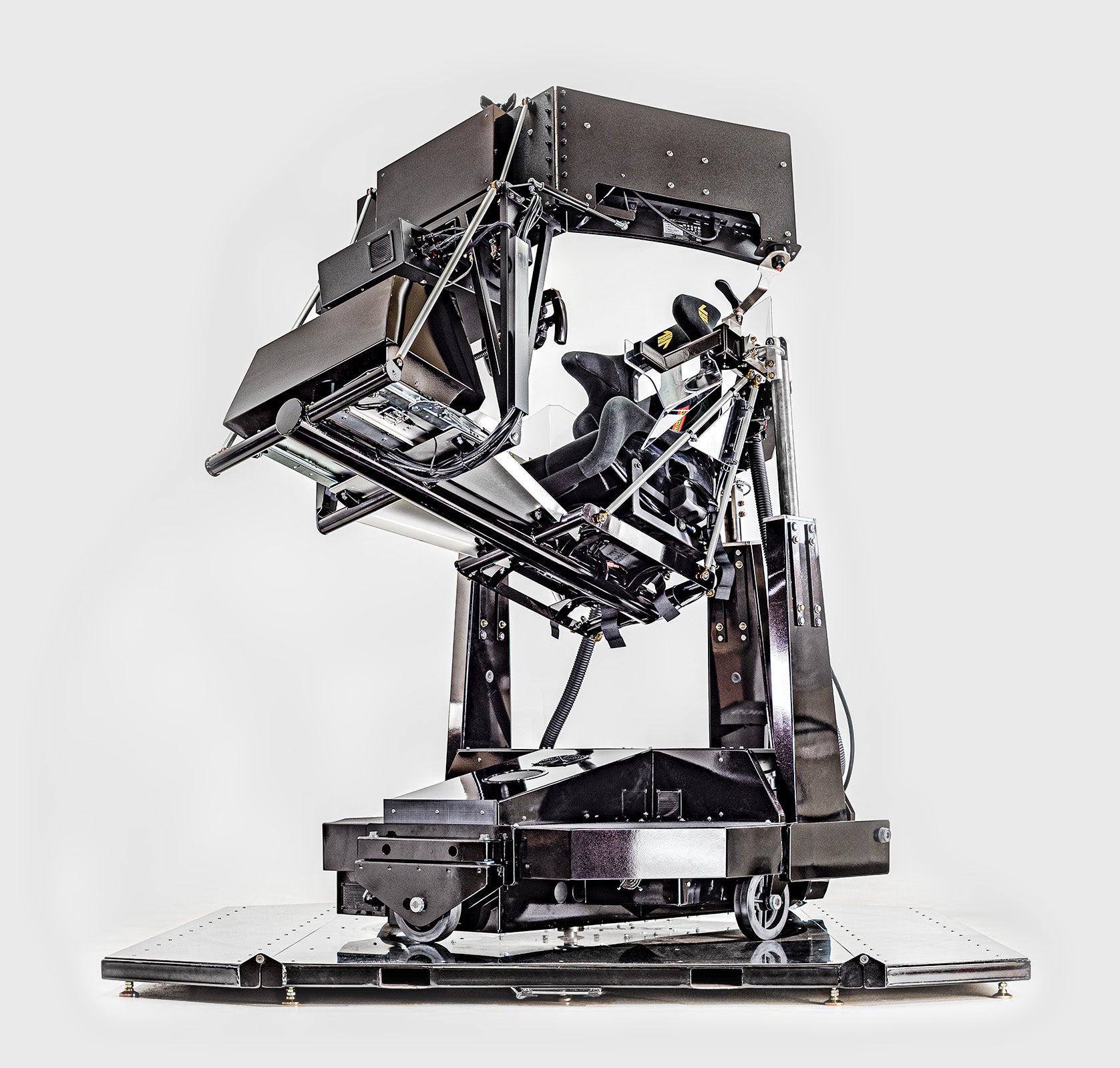 Force Dynamics 401cr commercial motion platform — low-angle tilt